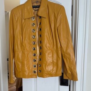 Mustard Yellow Leather Jacket with Grommet Accents Holes.